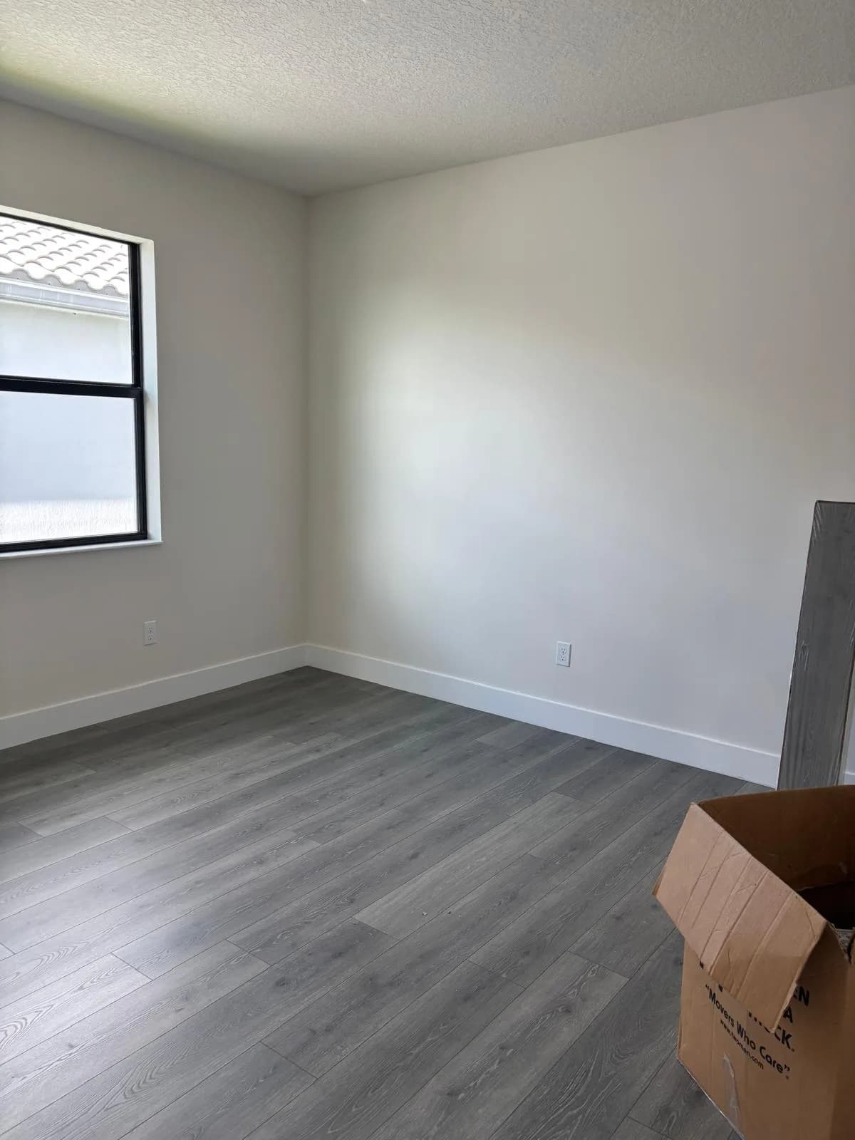 Interior Painting Grey Bedroom Lake Worth by JC General Painting in South Florida