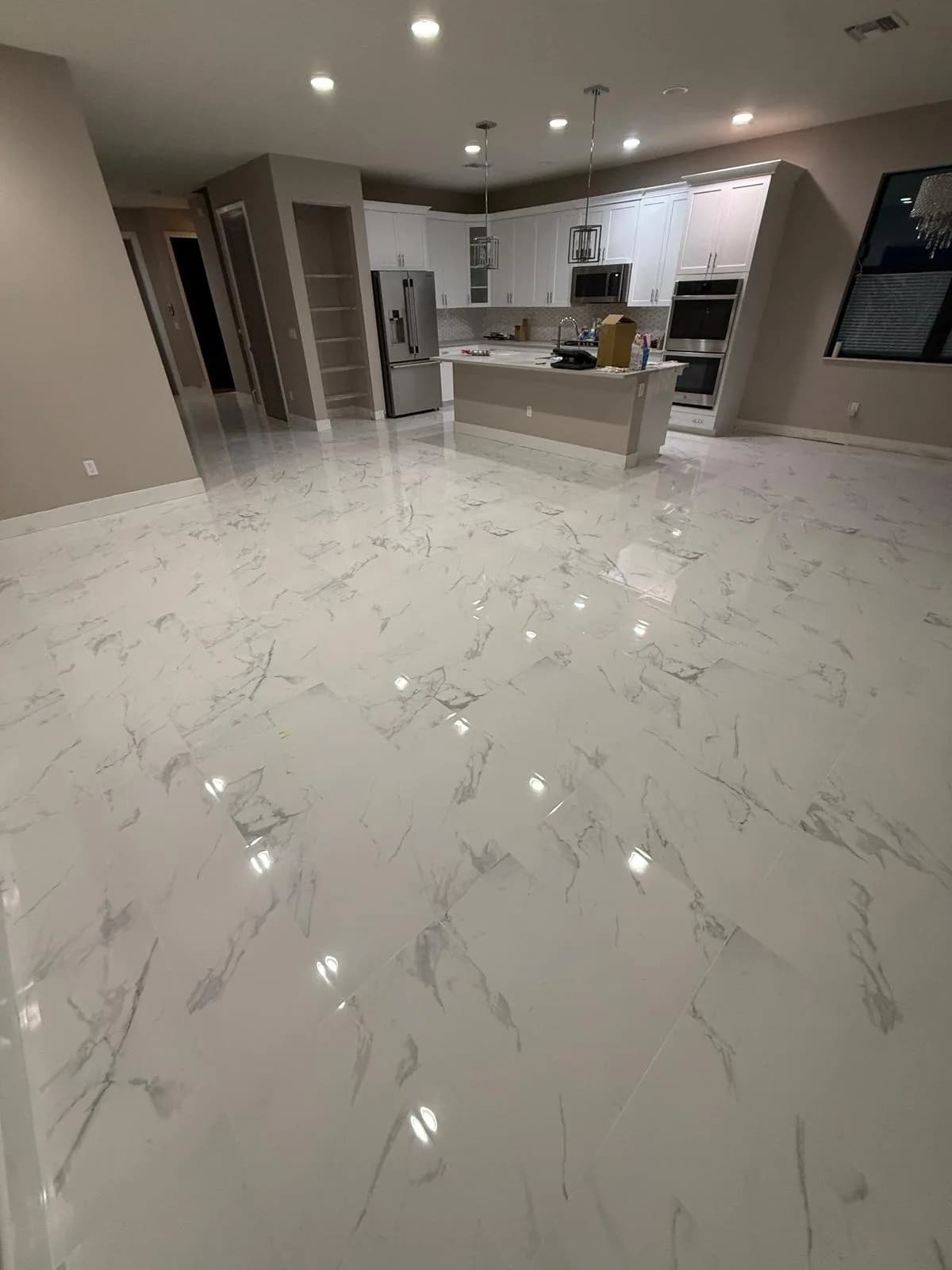Marble Tile Flooring Open Kitchen Parkland by JC General Painting in South Florida