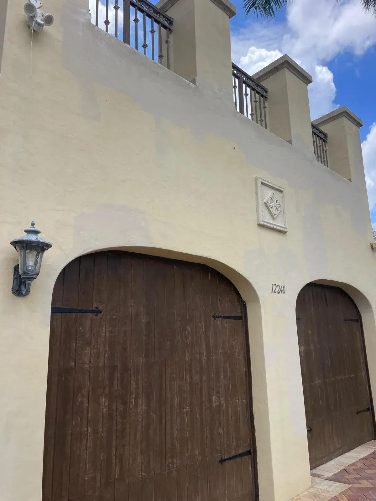 Exterior Stucco Painting Garage Archway Pompano Beach by JC General Painting in South Florida