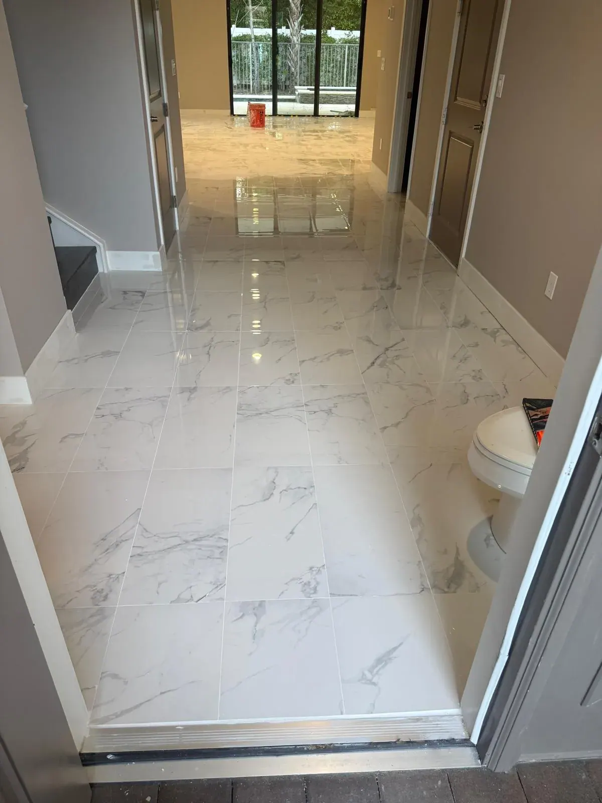 Marble Flooring Installation Entry Foyer Pompano Beach by JC General Painting in South Florida
