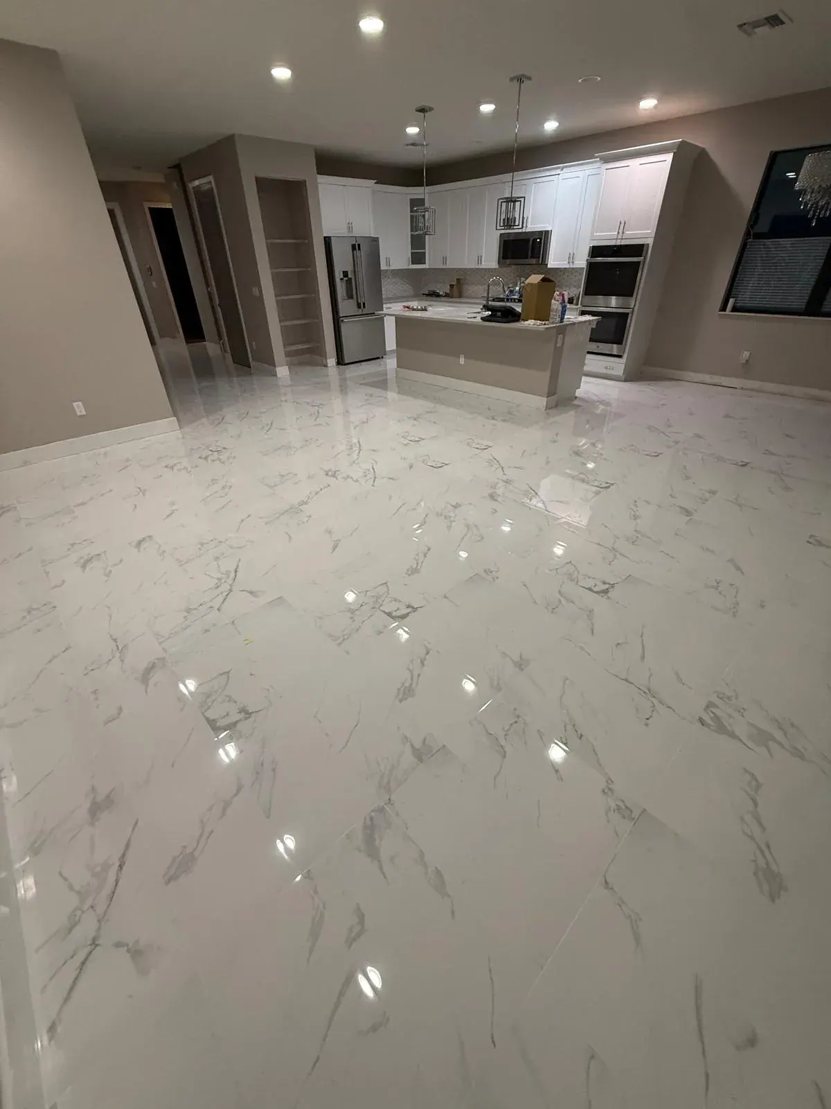 Marble Tile Flooring Open Kitchen Pompano Beach by JC General Painting in South Florida