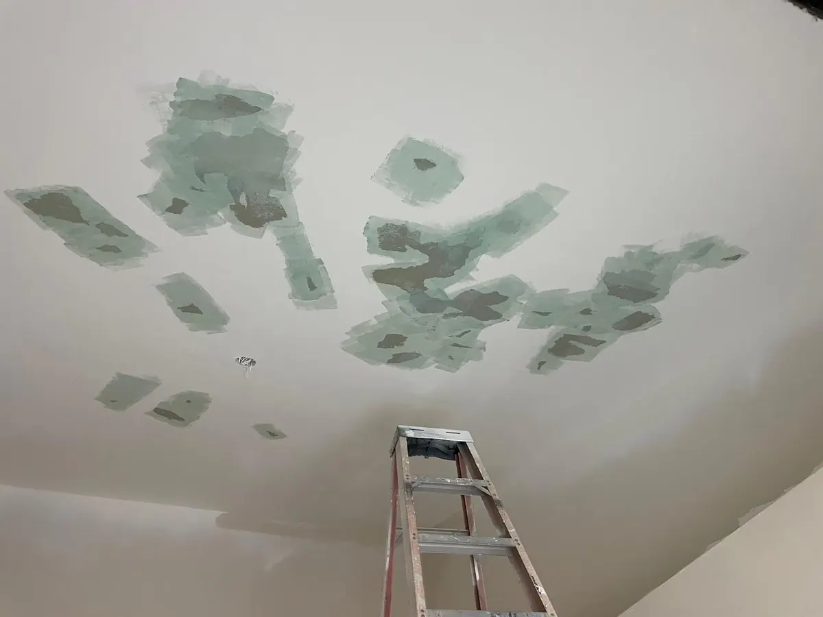 Multiple ceiling drywall patch repairs before painting by JC General Painting in South Florida