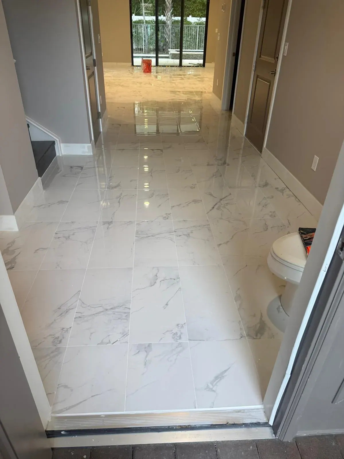Marble Flooring Installation Entry Foyer by JC General Painting in South Florida