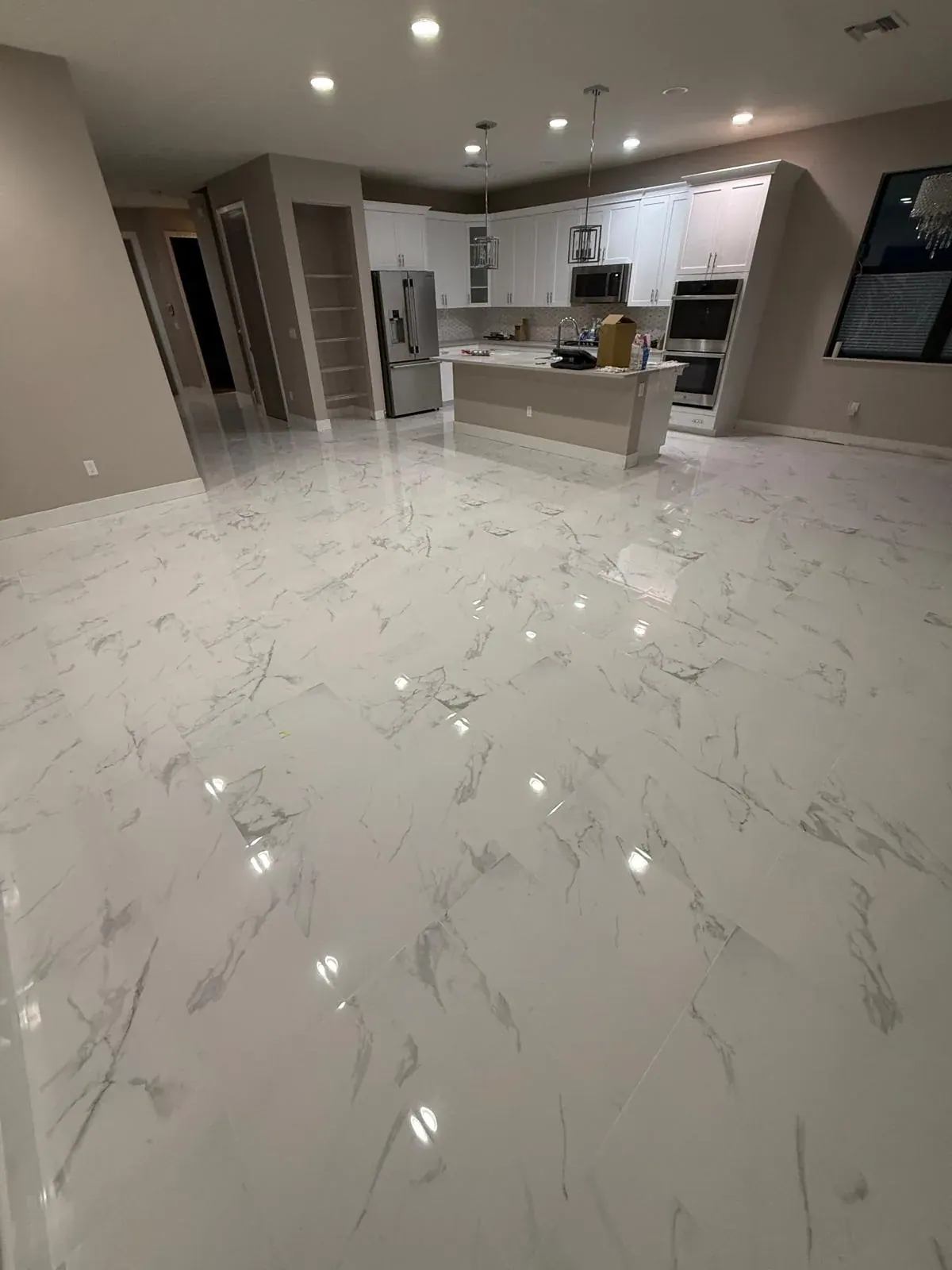 Marble Tile Flooring Open Kitchen by JC General Painting in South Florida