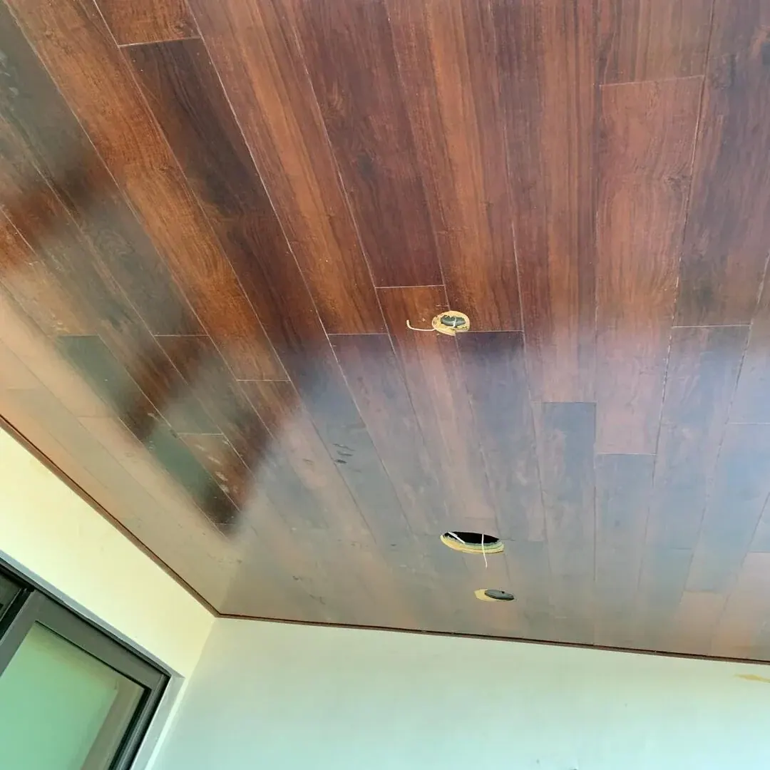 Custom wood plank ceiling detail by JC General Painting in South Florida