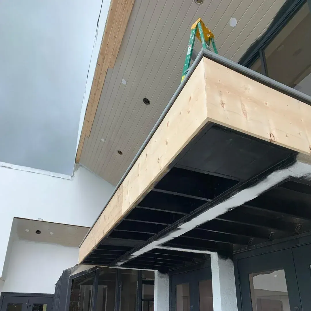 Modern wood soffit and eave exterior detail by JC General Painting in South Florida